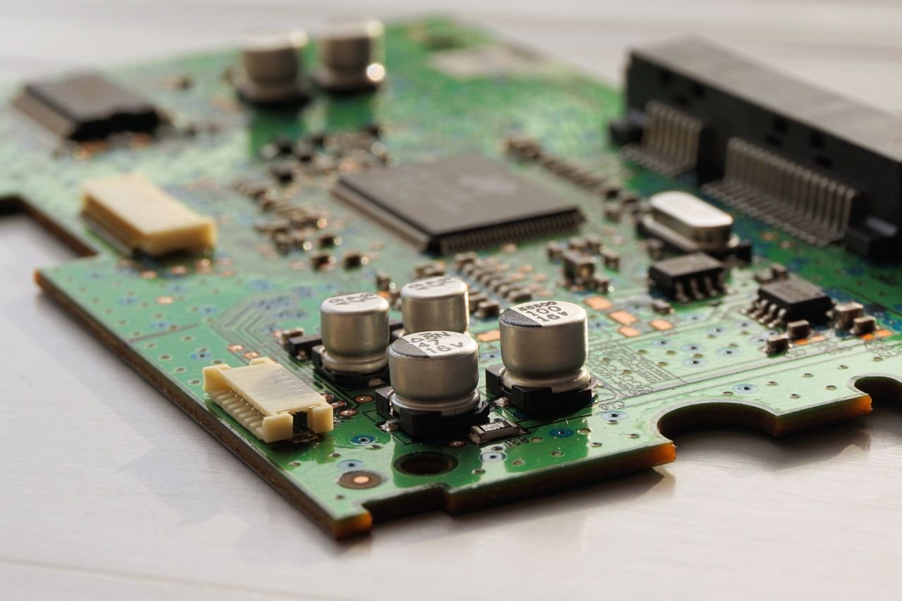 Existing circuit board next to measurement and drawing references